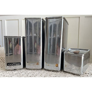 Set of 4 Vintage MCM Lincoln Beautyware Wedge-Shaped Chrome Storage Canisters